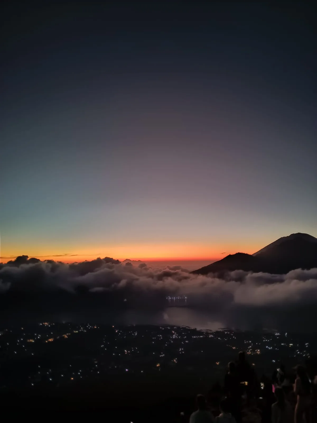 Sunrise above the clouds during the Mount Batur trekking experience